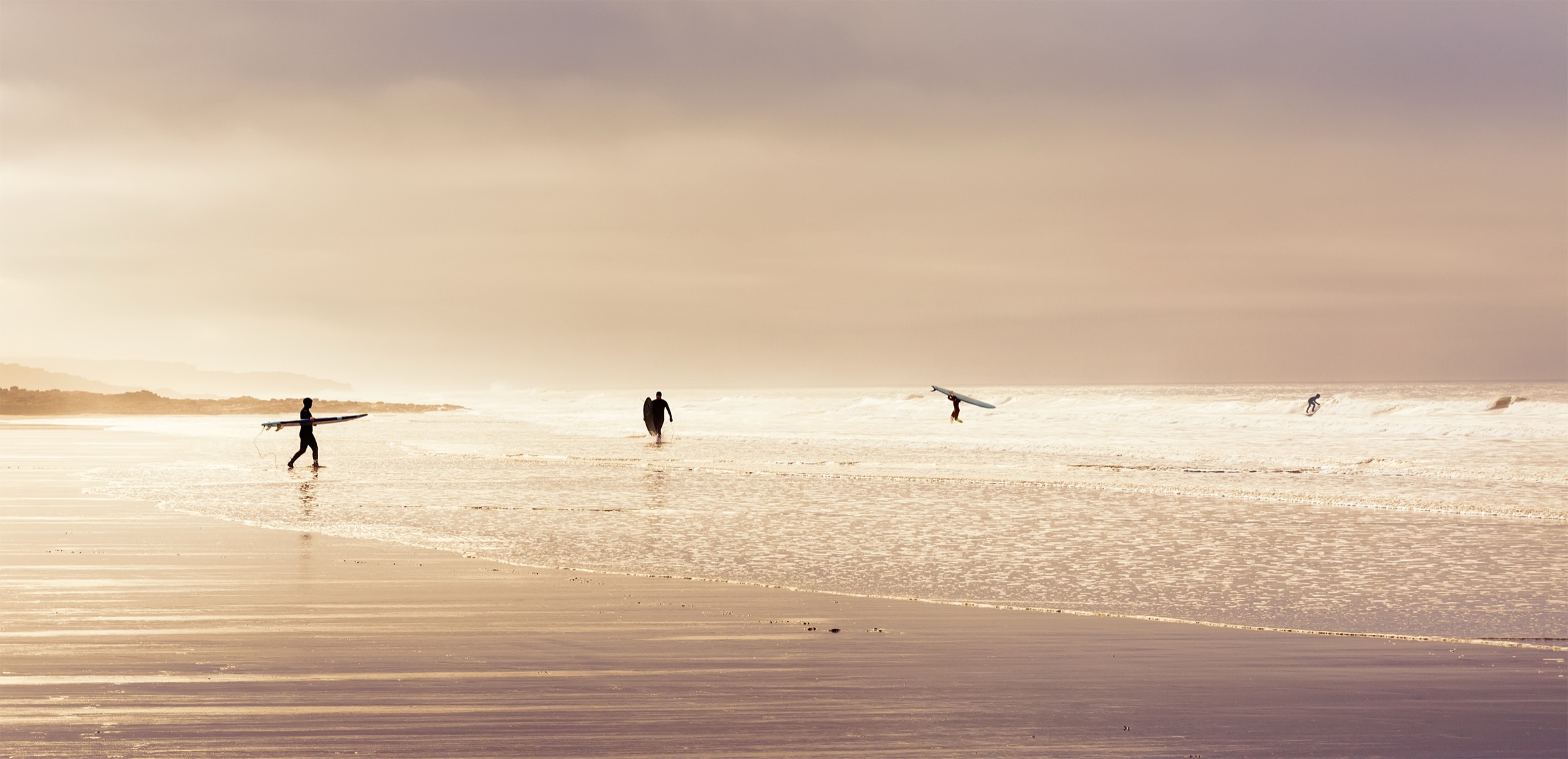 Surfers off Porthcawl