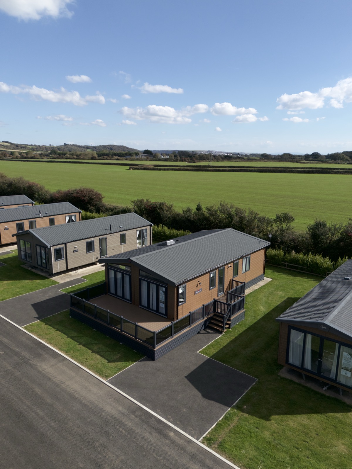 Lodges and open lawns at Nottage Park Lodges